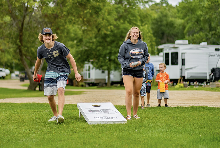 Teens Playing Beanbag Toss